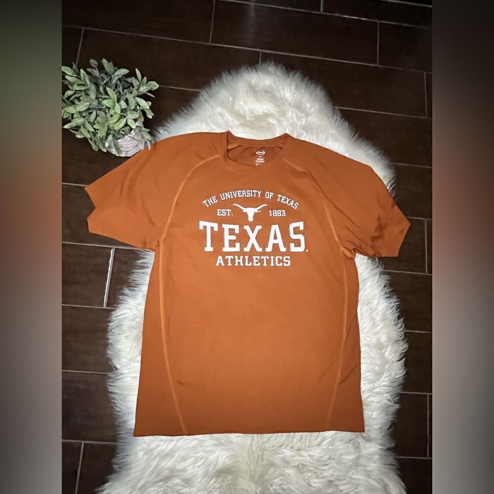 The University of Texas quick dri shirt sz medium